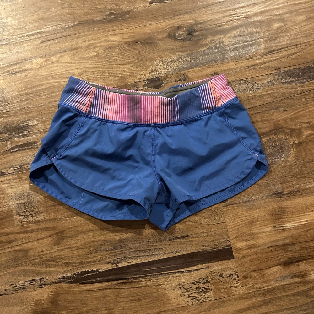Ivivva 2.5 inch blue shorts, size kids 12
